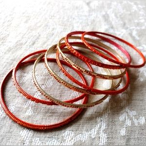 Set of 8 orange and gold bangles